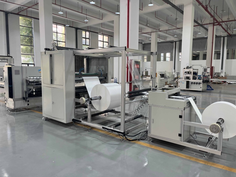 automated filter paper folding and adhesive application machine